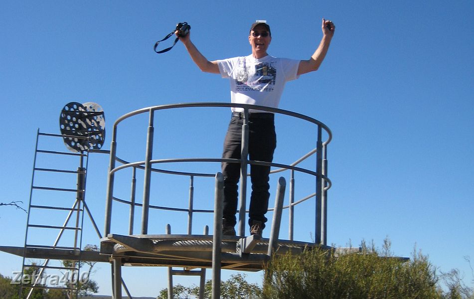 30-Laurie takes in the views from Hensley Trig lookout on the Border Track.JPG